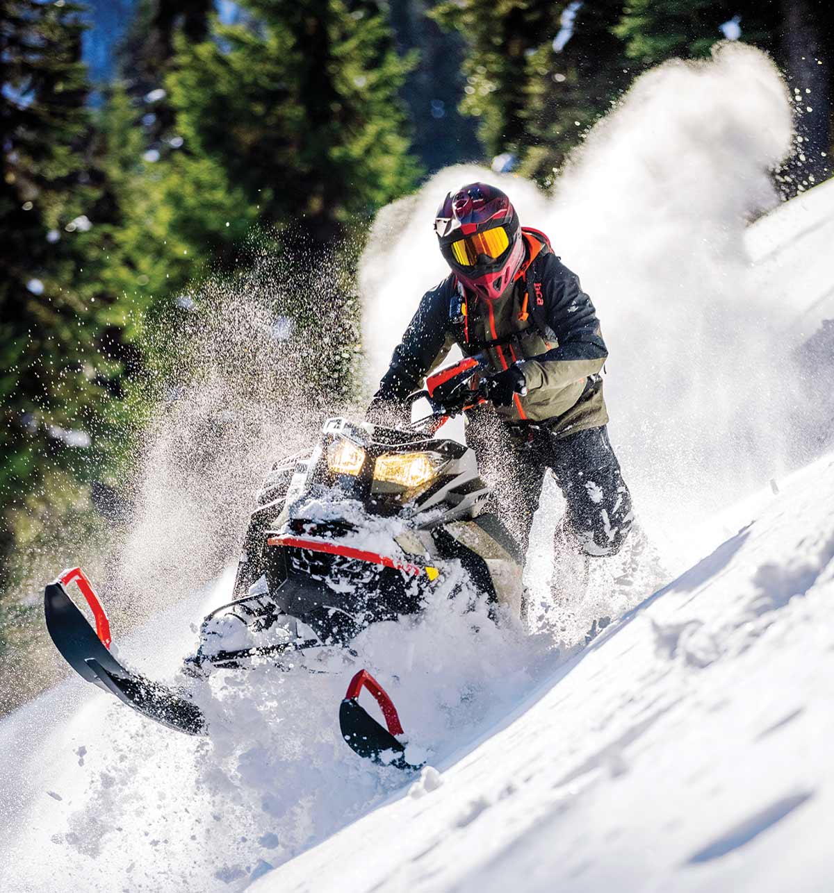 Rider kicking up snow in the 2022 Ski Doo