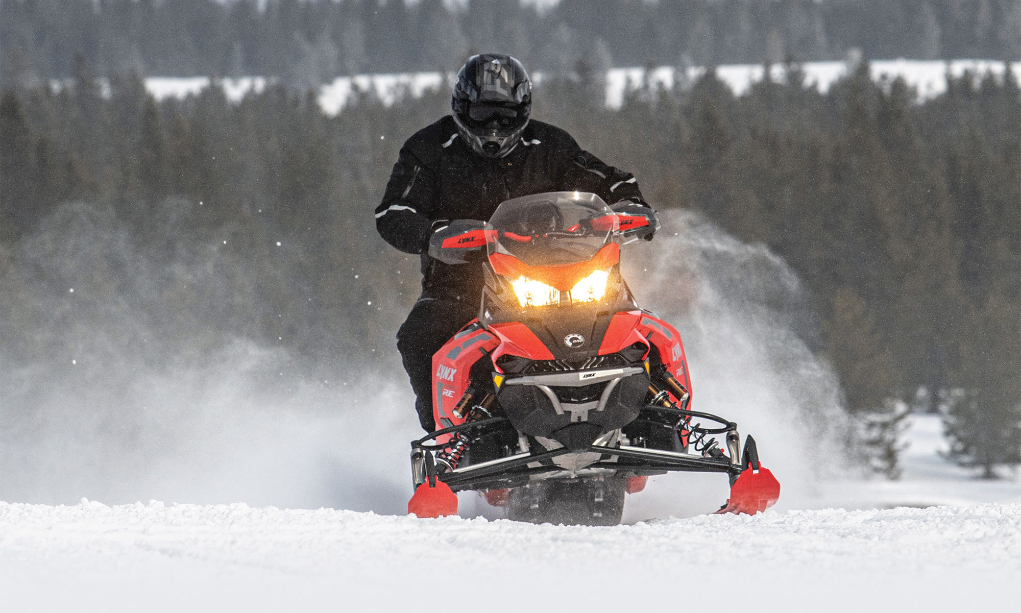 Lynx Xtreme RE snowmobile being ridden in snow