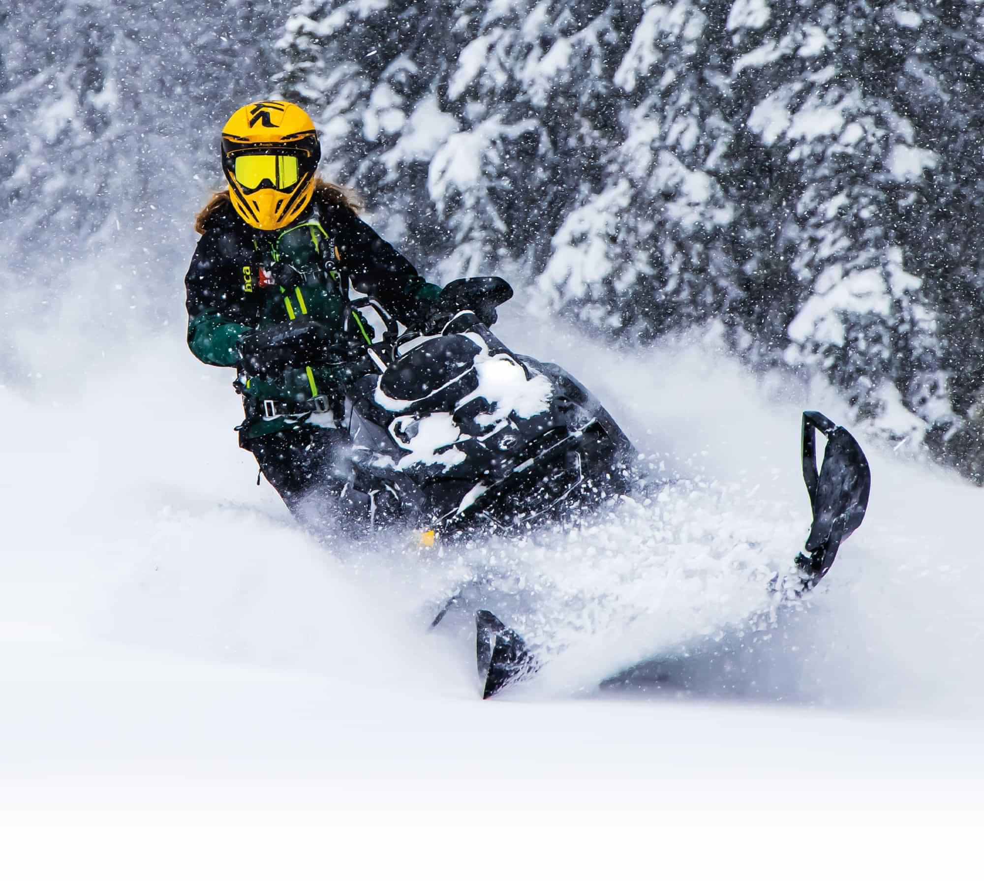 a rider shreds ice on a ski-doo Summit Edge