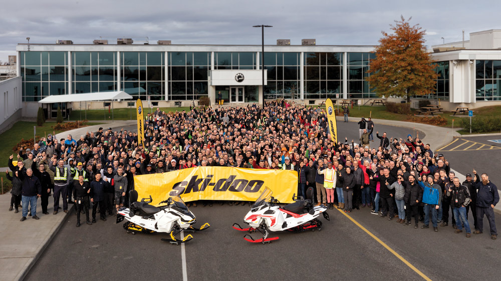 Group photo taken after the first Ski-Doo and Lynx electric-powered snowmobiles rolled off the production line in Valcourt back in November.